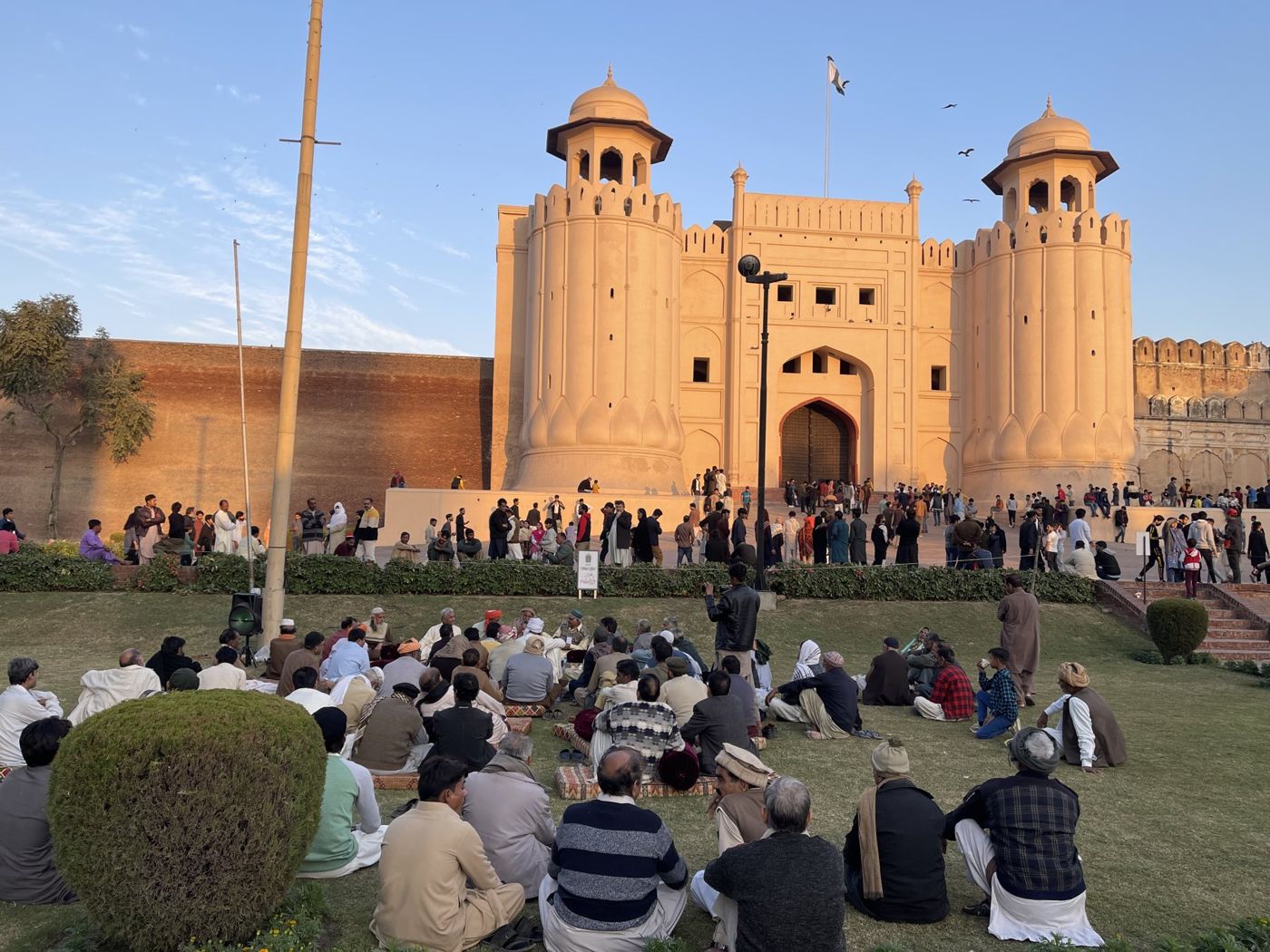 An open-air gathering on the lawns before Alamgiri Gate, Lahore Fort
